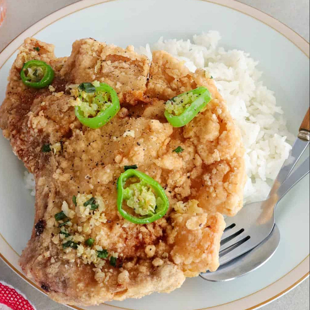 J6. Salted and spicy pork chops on Rice