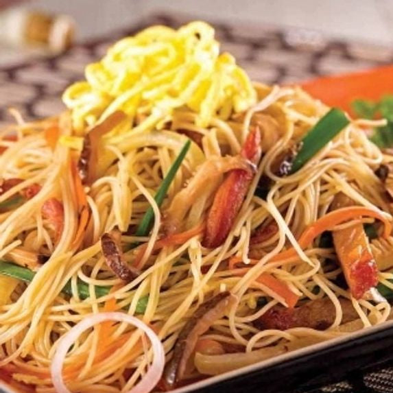 Noodles with vegetables on a plate