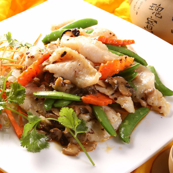 Bass filet sautéed with spicy XO chili sauce - Restaurant PM