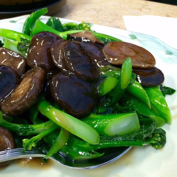 Chinese broccoli with Chinese mushrooms - Restaurant PM