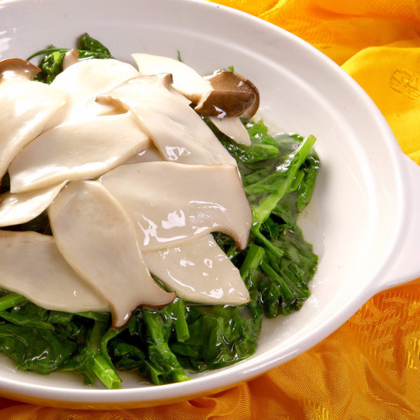 Stir fried snow pea leaves with king mushrooms - Restaurant PM
